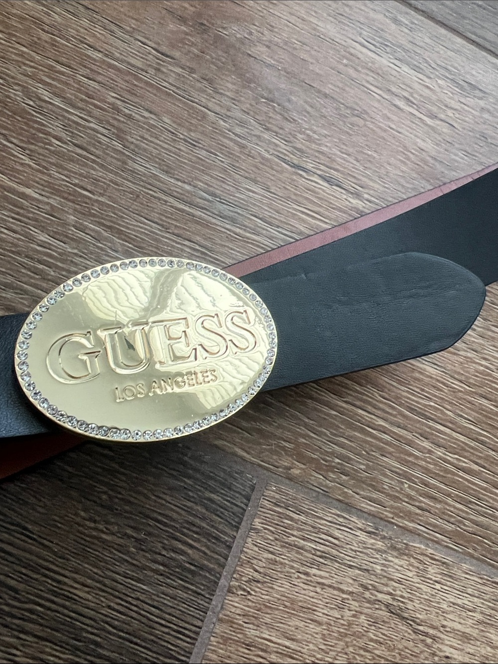 GUESS Black Belt with Gold Crystal-Trim Oval Logo Buckle